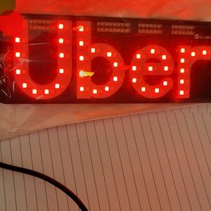 Uber sign for the driver
